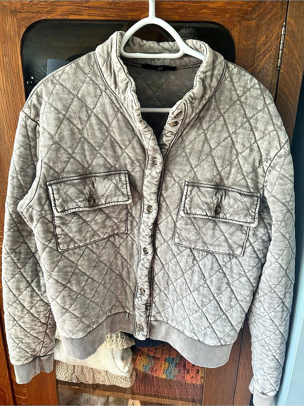 Jane + Delancey Quilted Acid Wash Bomber Jacket in a light gray wash.